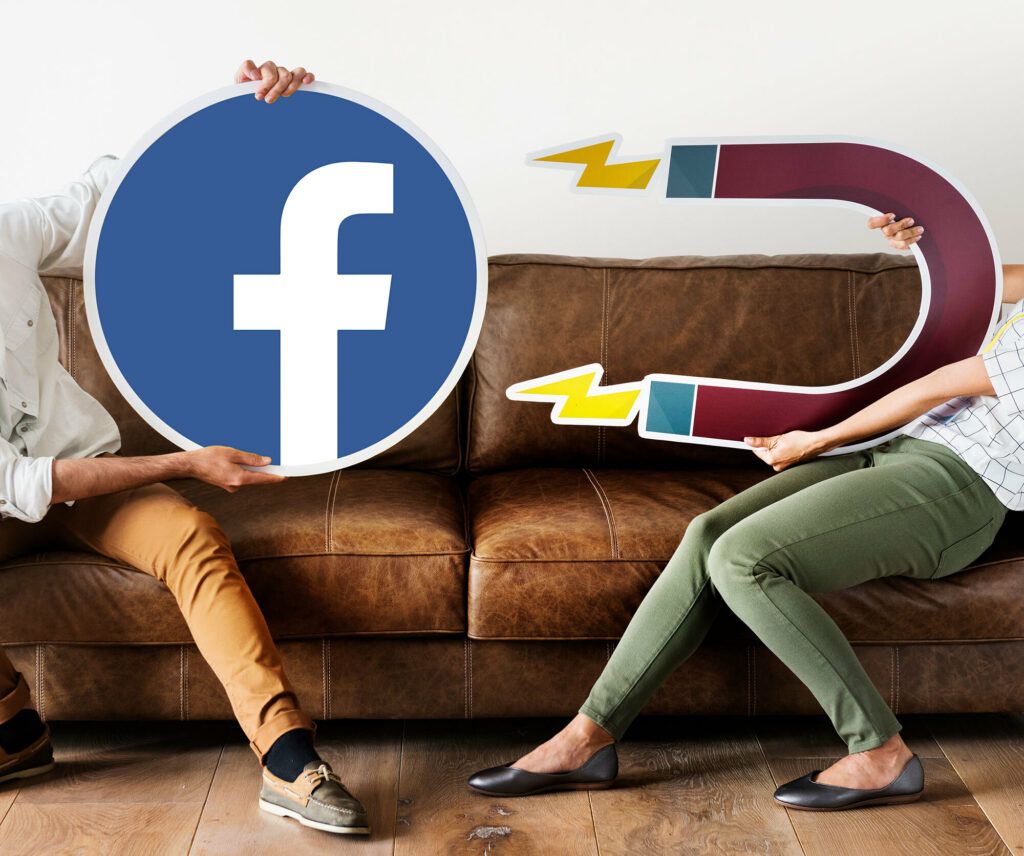 Magnes przyciąga logo Facebook - symbol pozyskiwania odbiorców na Facebooku 